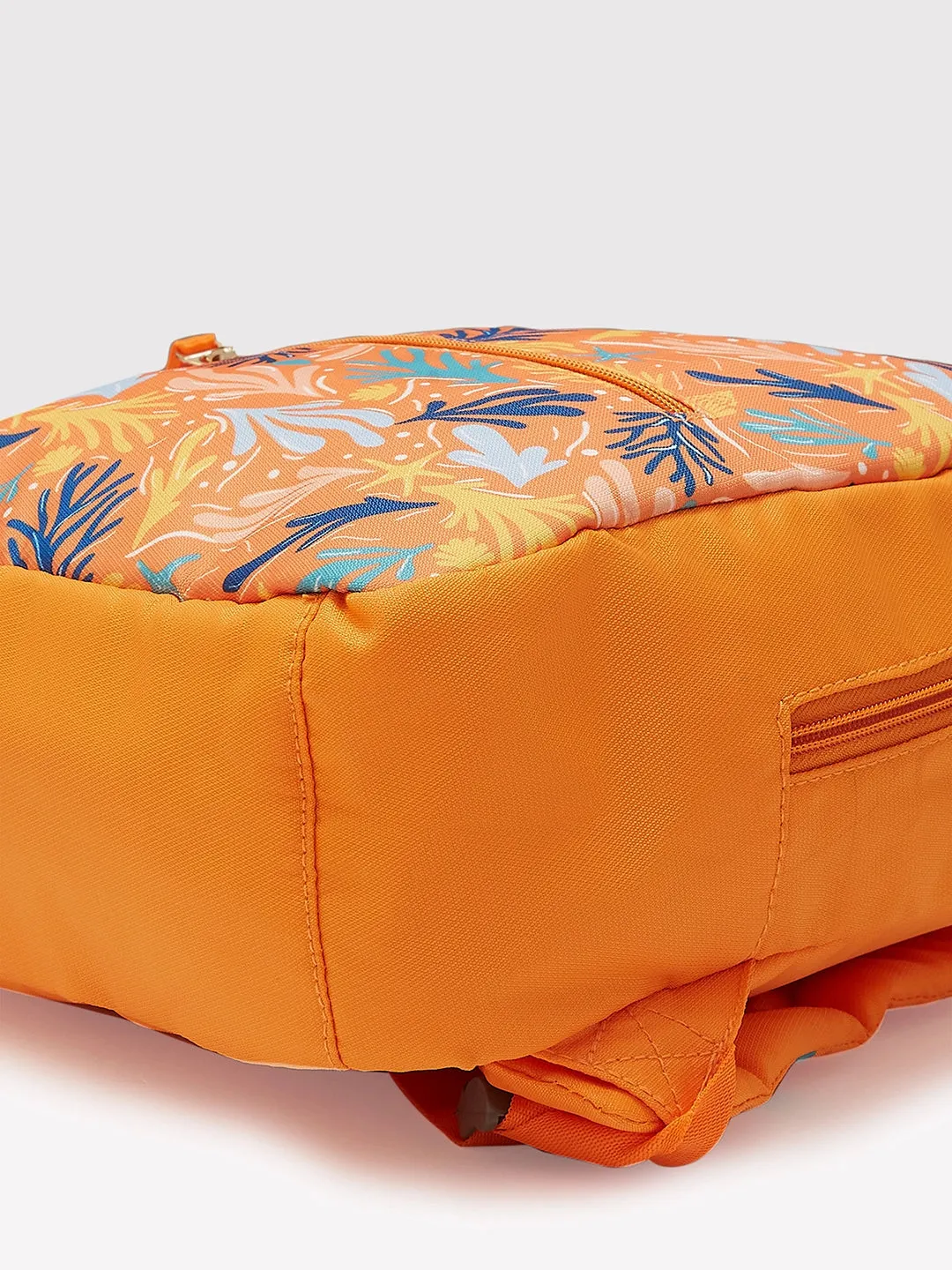 Caprese Xenia Backpack Small Orange Printed