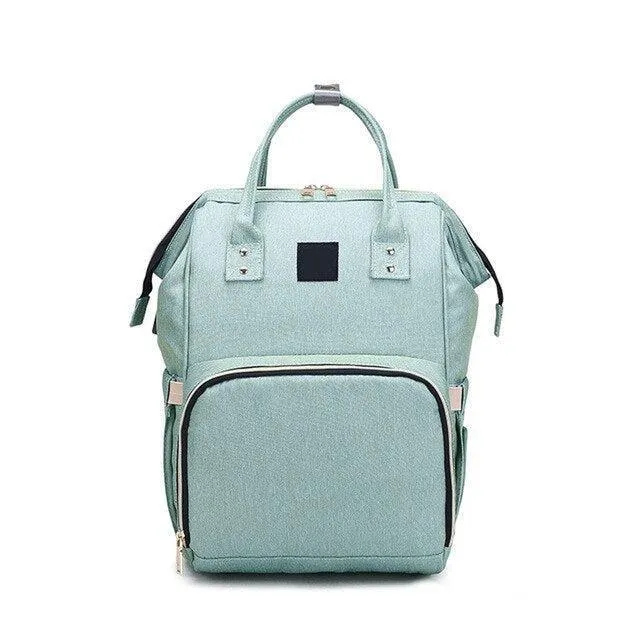 Chic Canvas Diaper Backpack: Trendy Mommy Bag with Smart Storage Solutions